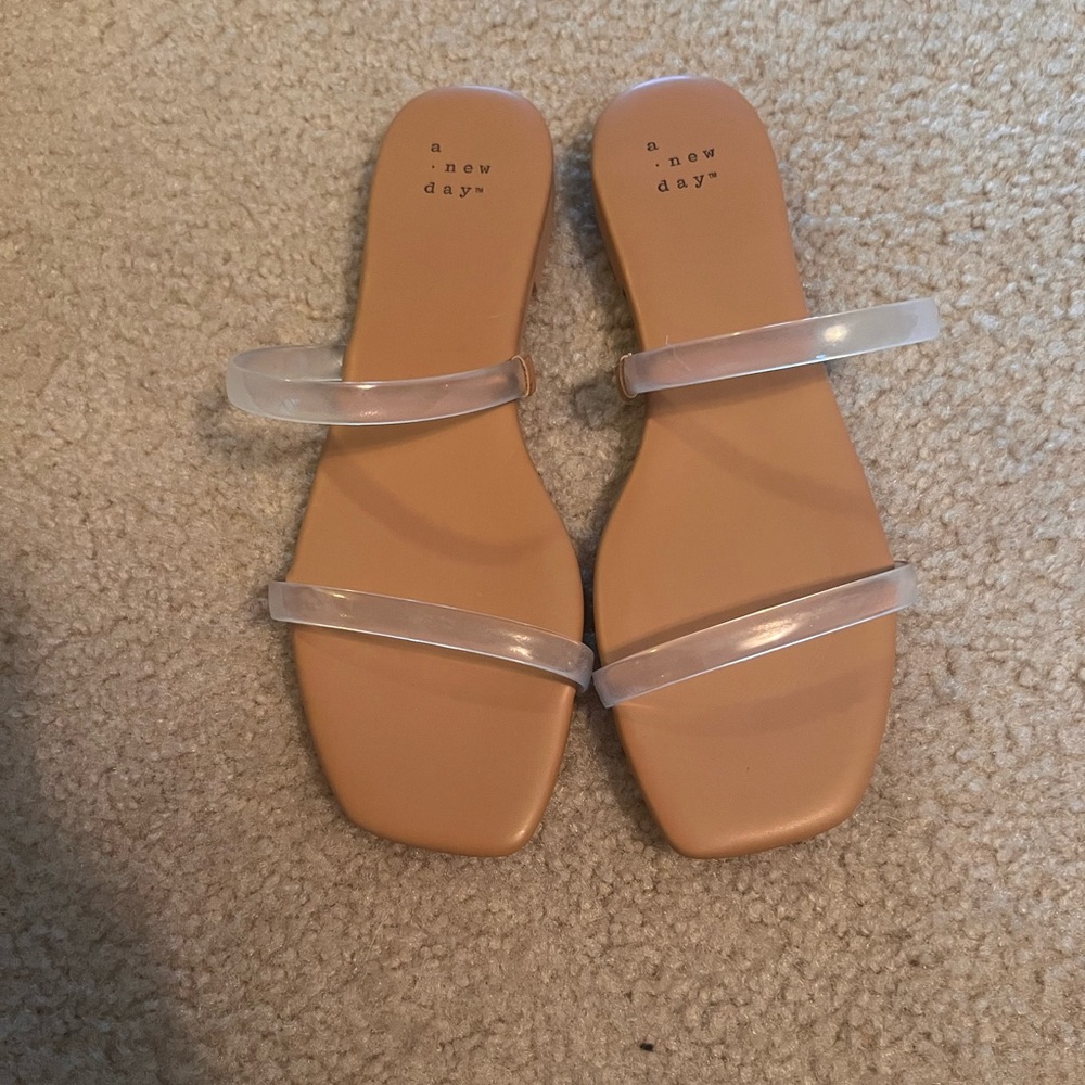 Never worn, 7.5 clear sandals